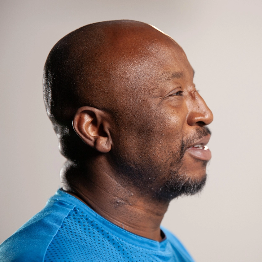 Profile photo of Russell Davis, former NFL player and host of sports podcast The Route with Russell, produced by the Motivated Mind Group (MMG)